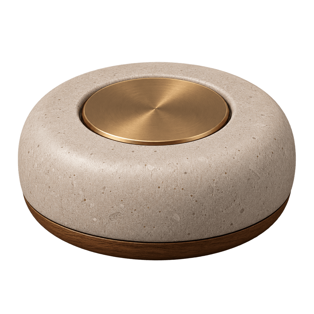 Round stone button with a recessed brass disk and walnut base.